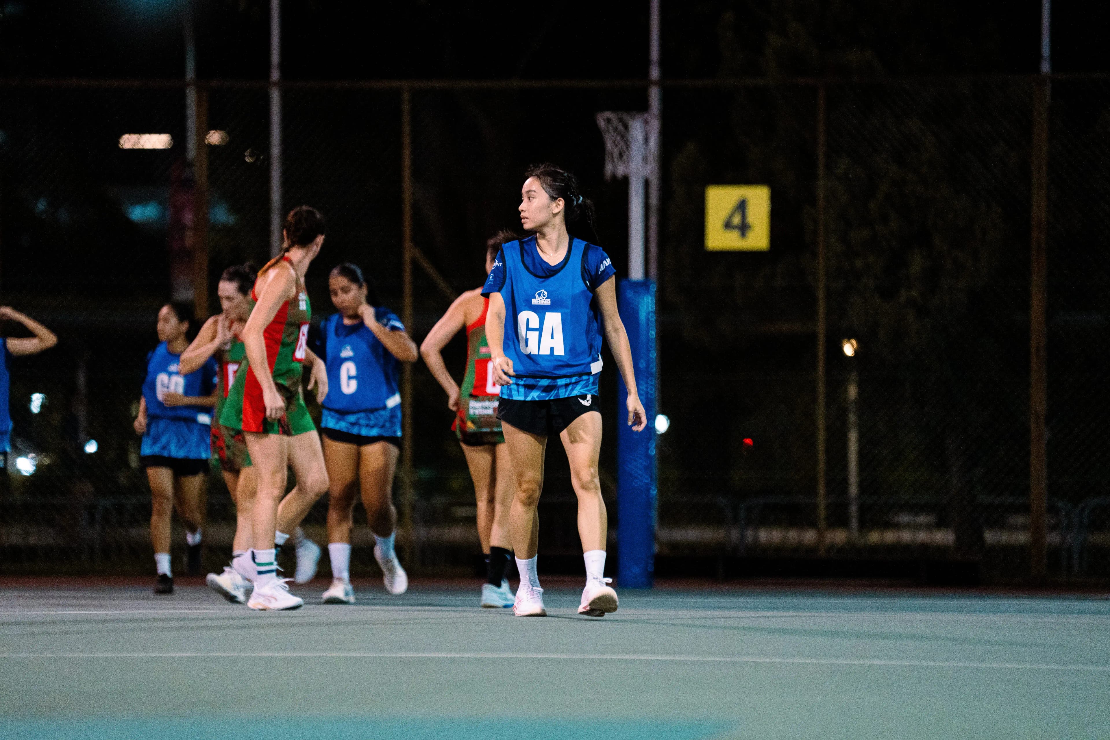 Dauntelica Rhinos netball athlete on court during competition match