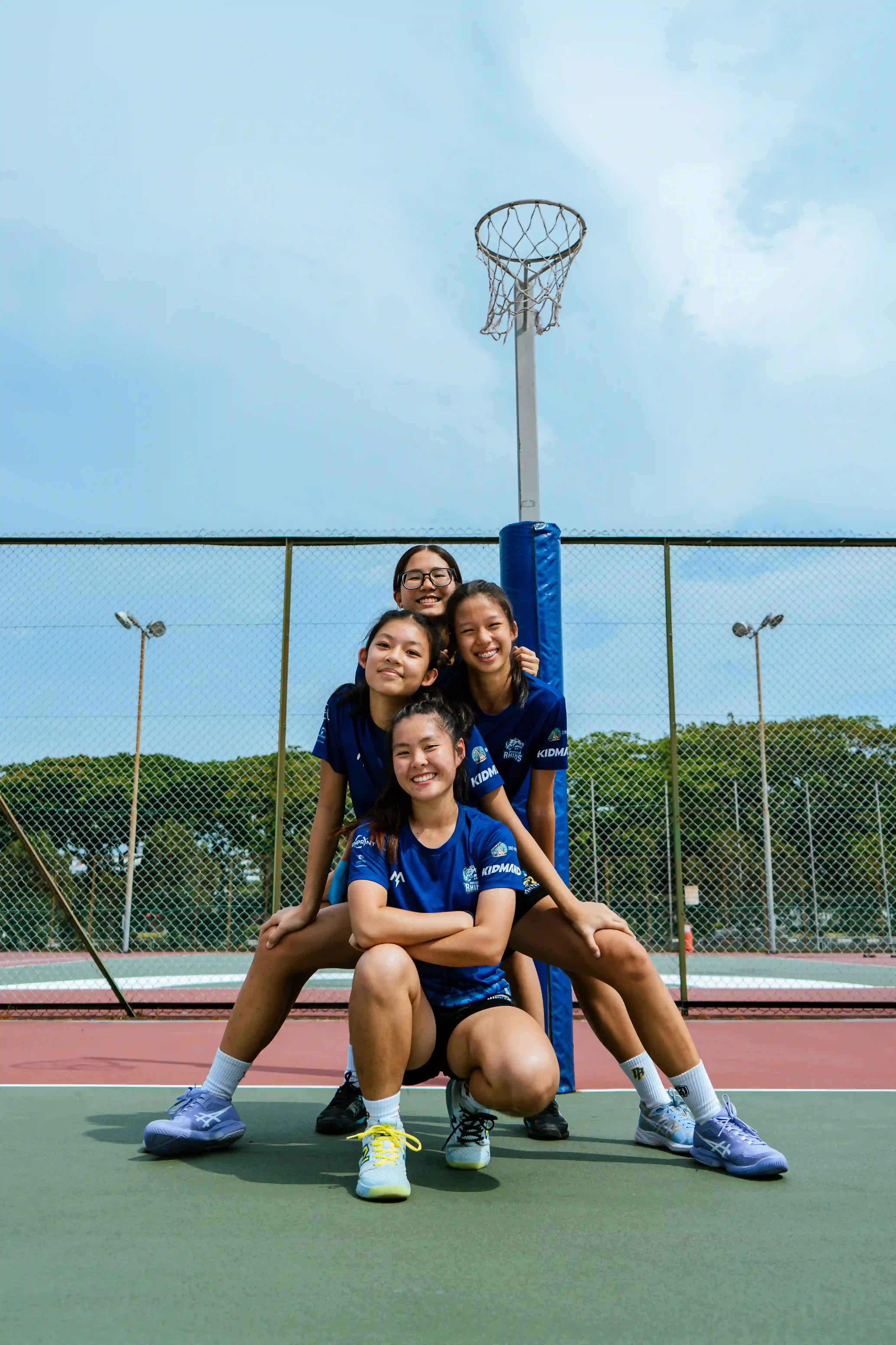 Rhinos athletes under the hoop during post-training wind down