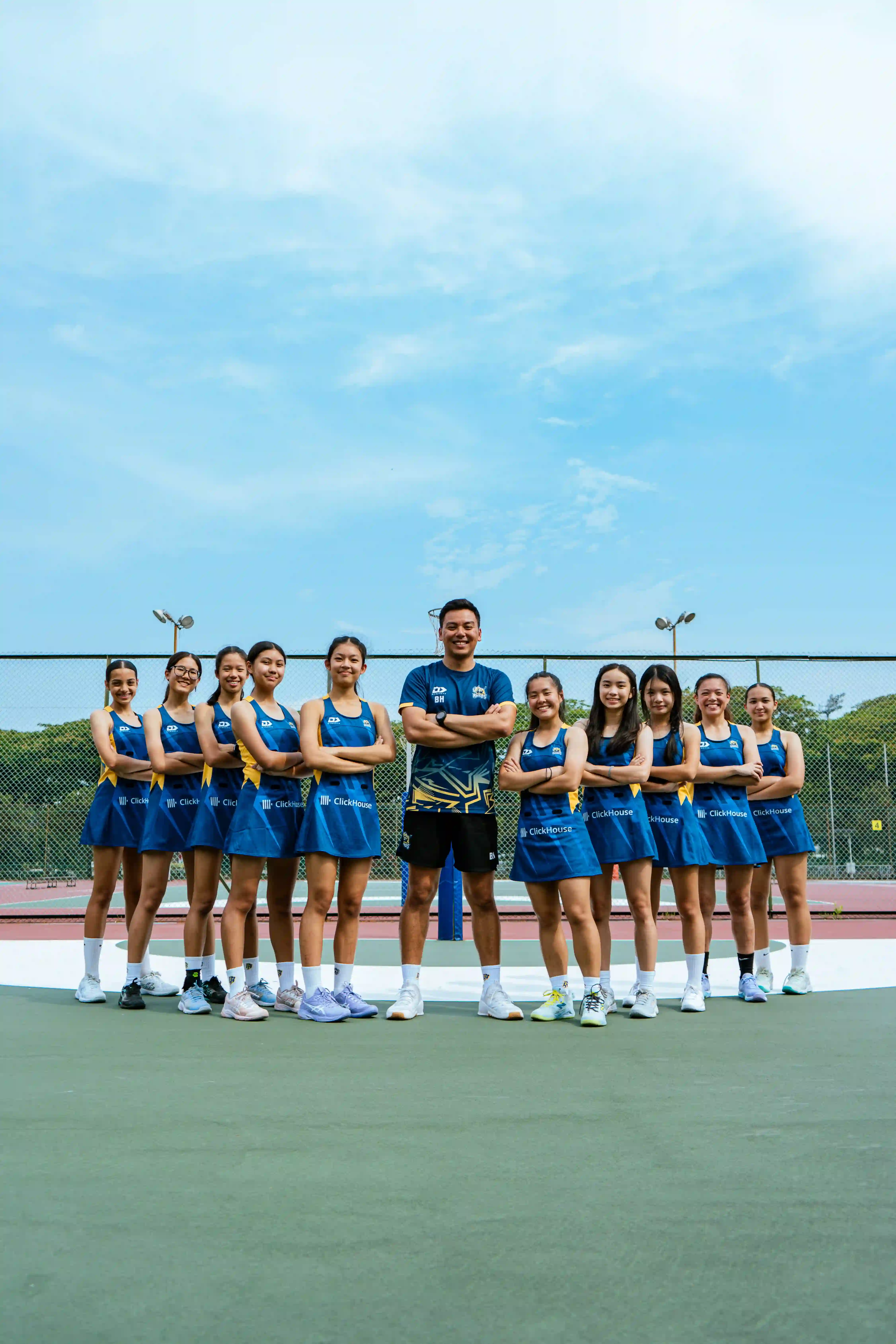 Dauntelica Rhinos athletes and head coach lined up on court